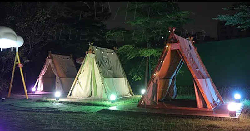LED uplight illuminating camping tent area