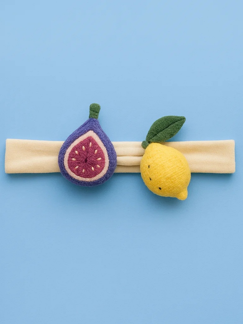 Bandeau pour bébé avec jouets en peluche figue et citron jaune