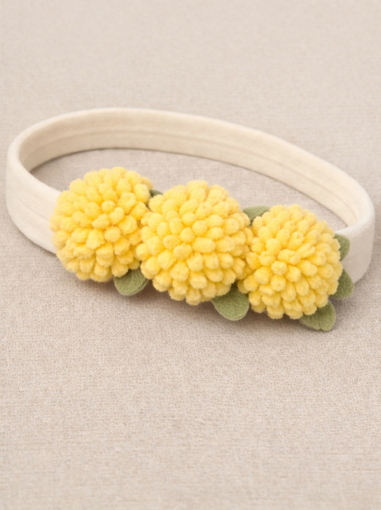 Baby Headband with Yellow Pom-Poms