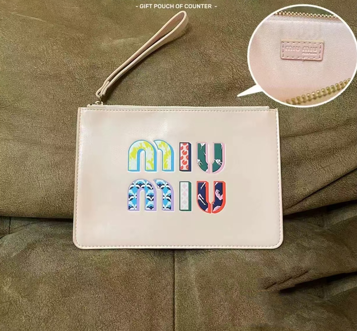 miumiu makeup bag