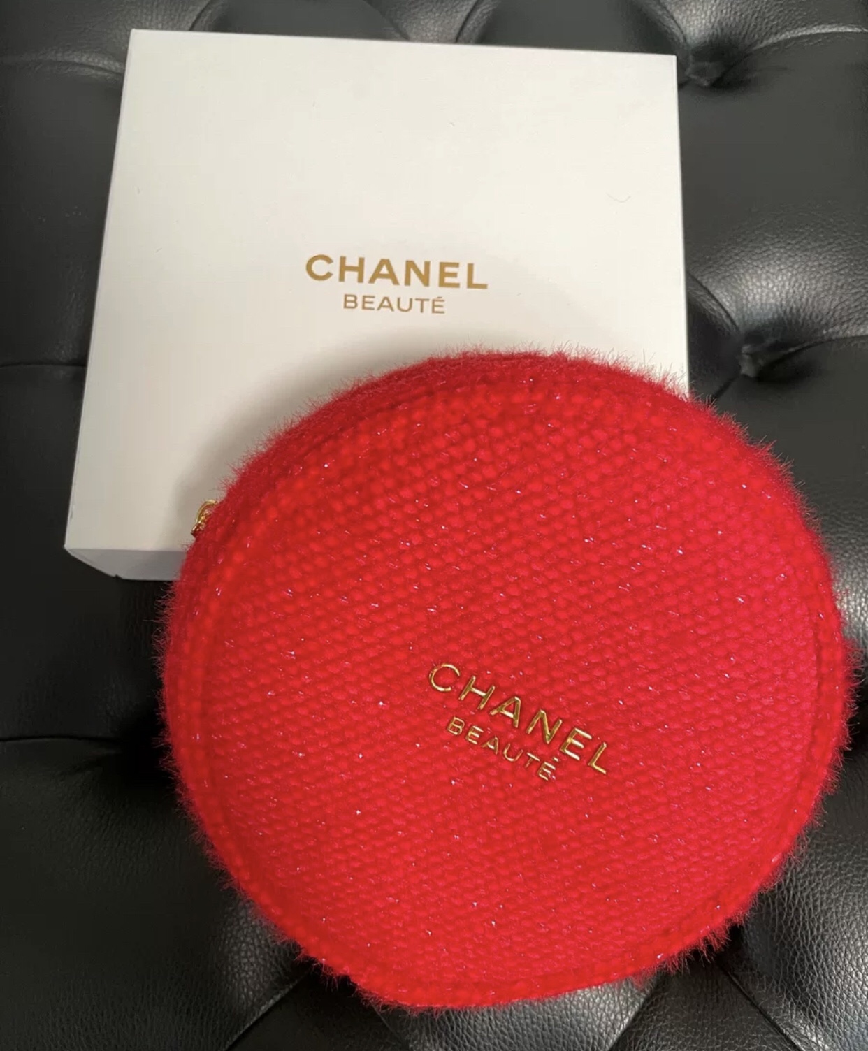 Chanel red makeup bag round