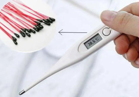 What is the design of thermistor electronic thermometer