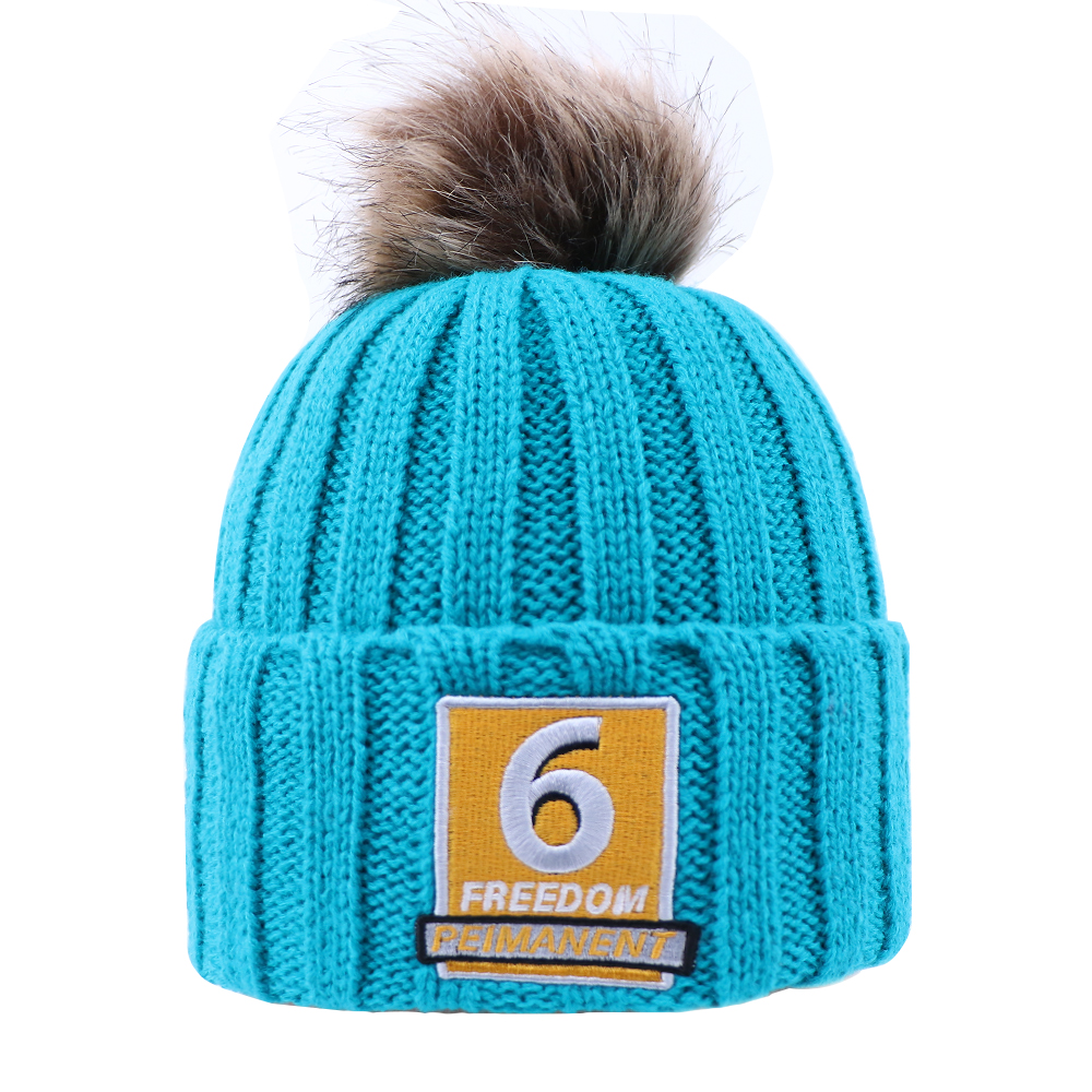 Blue Ribbed Knit Beanie with Faux Fur Pom and Embroidered Patch