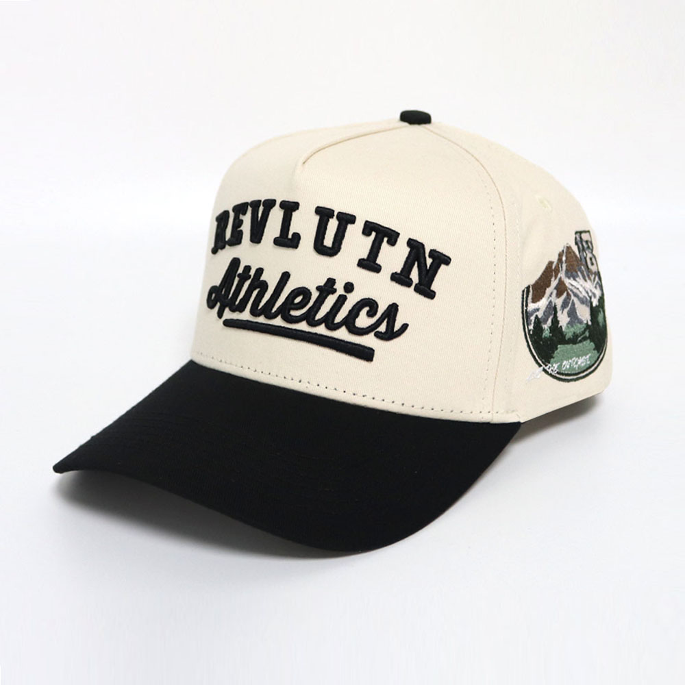 Cream and Black Two Tone Baseball Cap with REVLVN Athletics 3D Embroidery