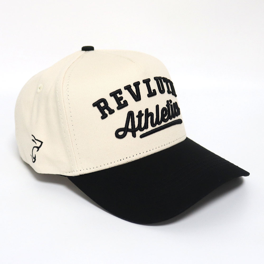 Cream and Black Two Tone Baseball Cap with REVLVN Athletics 3D Embroidery