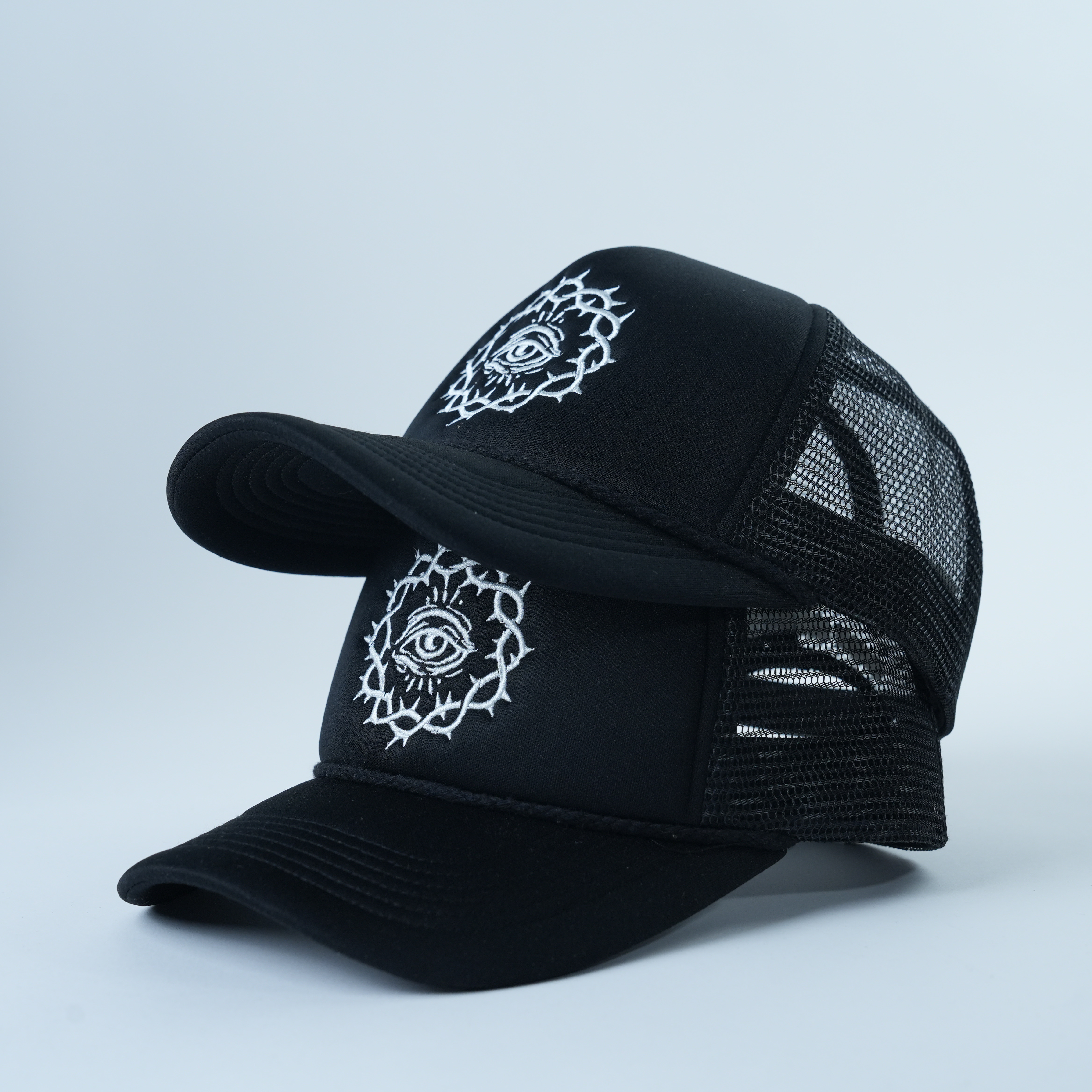 Black Mesh Trucker Hat with Eye Symbol Flat Embroidery