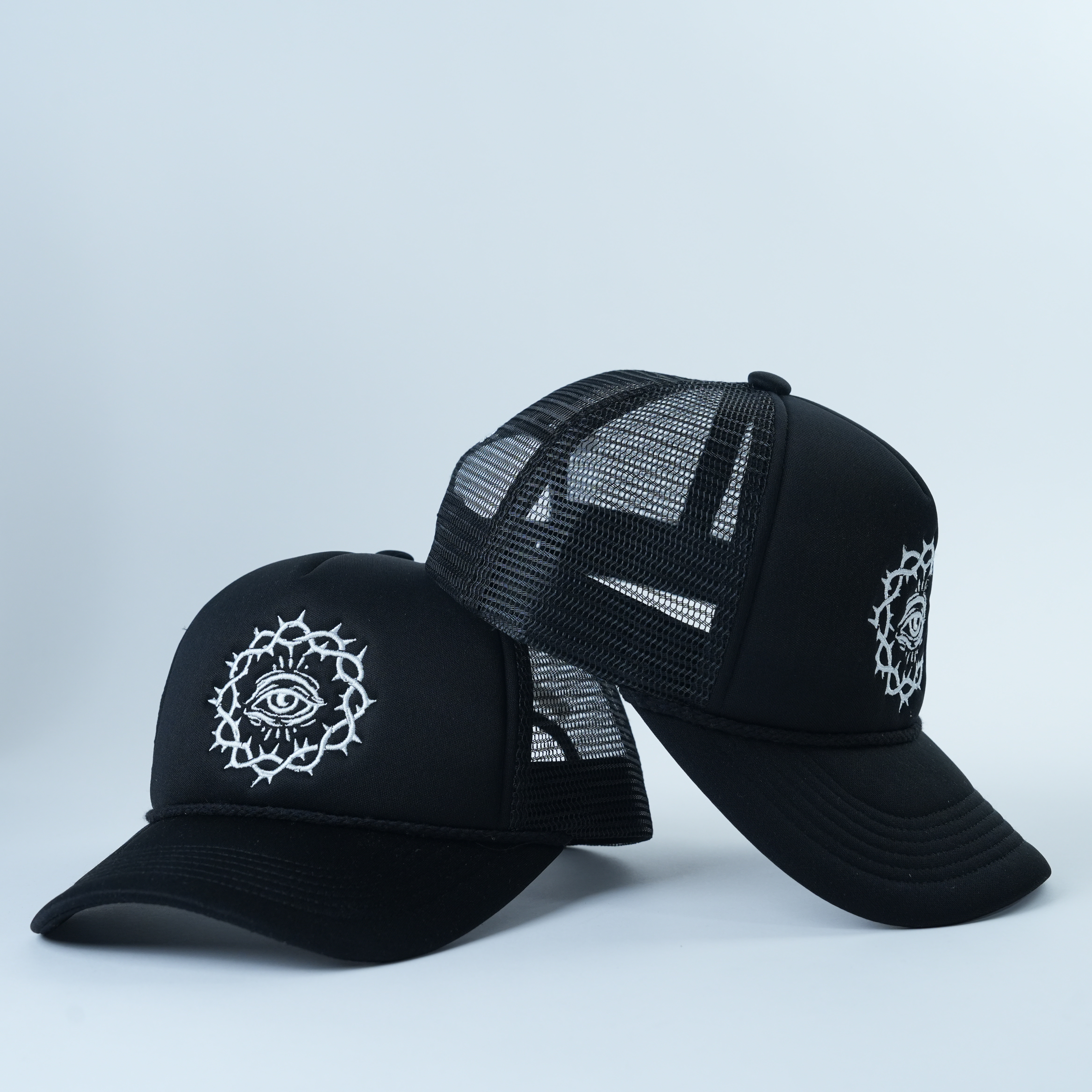 Black Mesh Trucker Hat with Eye Symbol Flat Embroidery