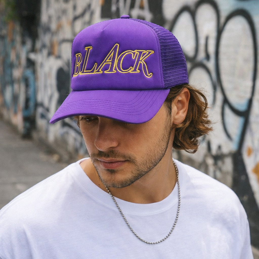Purple Trucker Hat with Yellow &quotBLACK MADE BY