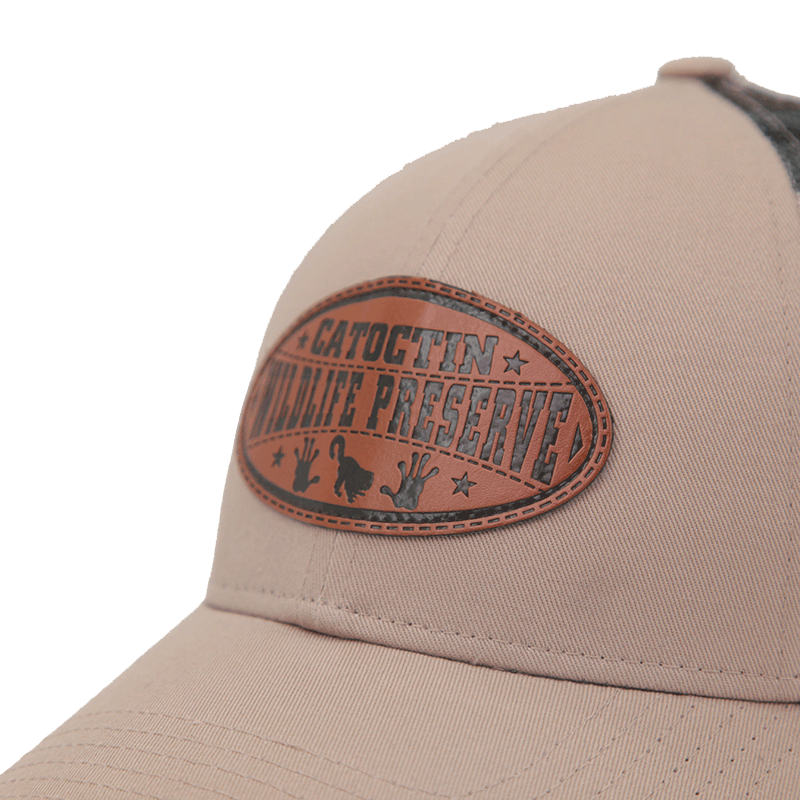 Wildlife Preserve Trucker Hat with Oval Leather Patch and Camo Mesh Back