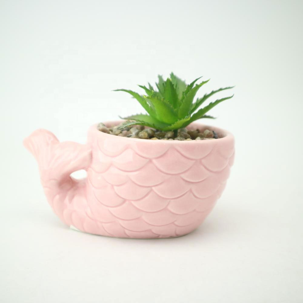 Small Ceramic Fish desgin Pot with Natural Touch Faux Succulent potted with simulated soil.