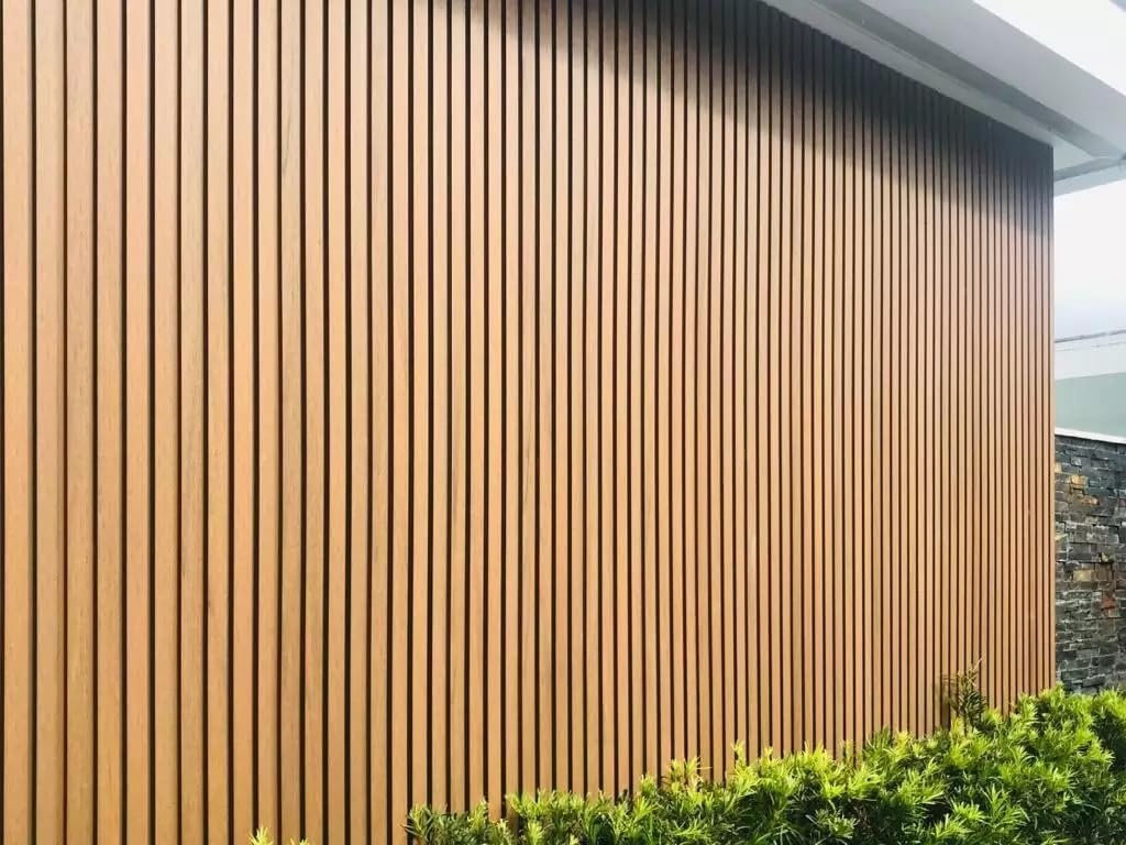 Panel de pared exterior impermeable coextrudido panel de pared exterior exterior compuesto de plástico de madera