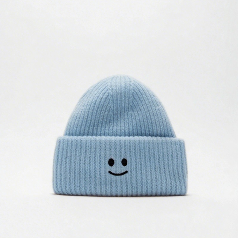 Cozy Winter Coarse Wool Knitted Cap with Embroidered smiley Face logo Patches. Ribbed Details for a Snug Fit, Locking in Warmth