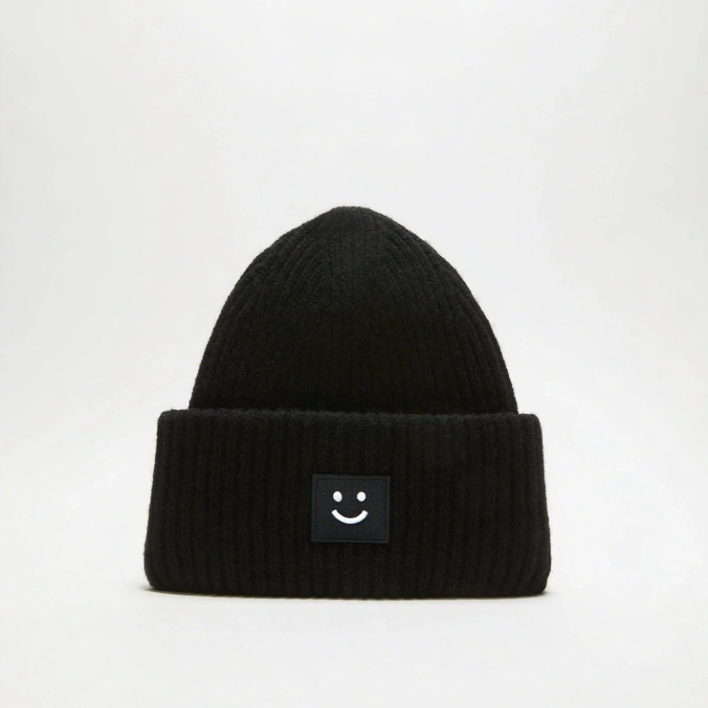 Cozy Winter Coarse Wool Knitted Cap with Embroidered smiley Face logo Patches. Ribbed Details for a Snug Fit, Locking in Warmth