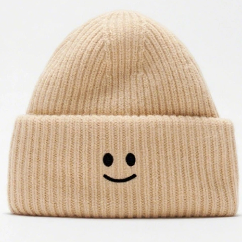 Cozy Winter Coarse Wool Knitted Cap with Embroidered smiley Face logo Patches. Ribbed Details for a Snug Fit, Locking in Warmth