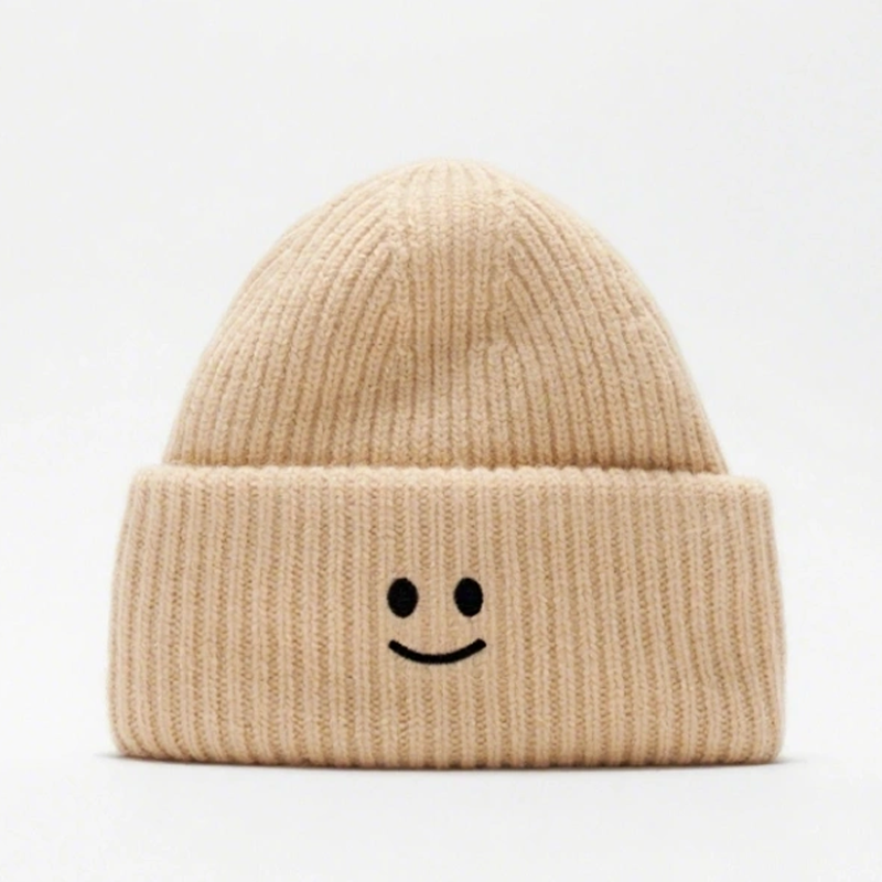 Cozy Winter Coarse Wool Knitted Cap with Embroidered smiley Face logo Patches. Ribbed Details for a Snug Fit, Locking in Warmth