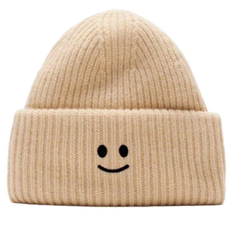 Cozy Winter Coarse Wool Knitted Cap with Embroidered smiley Face logo Patches. Ribbed Details for a Snug Fit, Locking in Warmth