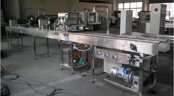 Semi-automatic chocolate block depositting  machine