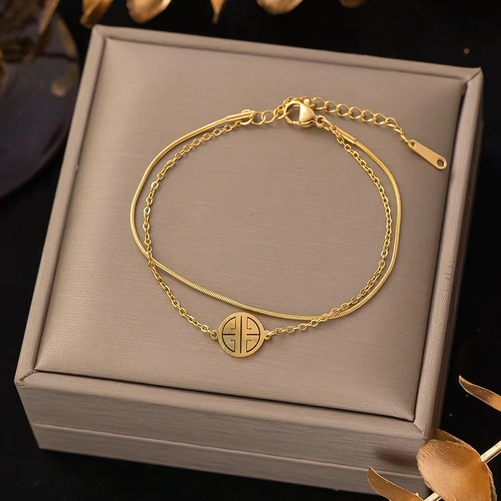 Double Chain Gold Bracelet with Longevity Symbol – Adjustable Elegant Jewelry