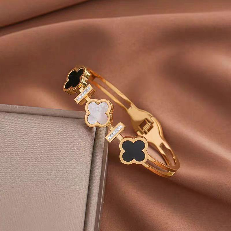 Elegant Triple Clover Bracelet for Women – 18K Gold Plated Stainless Steel Bangle with Black and White Enamel, Crystal Accent Bars, Luxurious Lucky Charm Jewelry for Gifts and Everyday Fashion