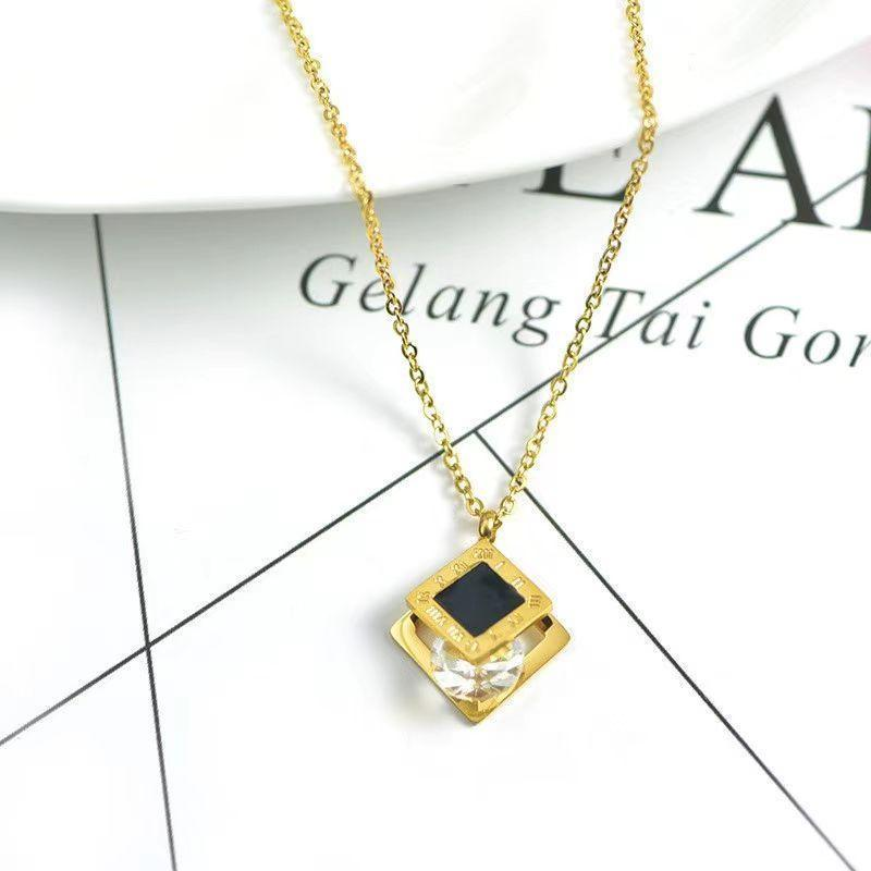 Geometric 3D Pendant Necklace – Gold Plated with Black Enamel & Zircon
