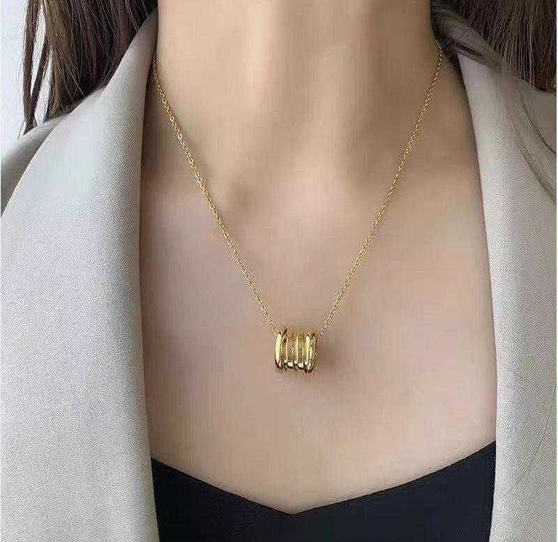 Geometric Titanium Steel Multi-Ring Pendant Necklace for Women – Modern & Chic Style