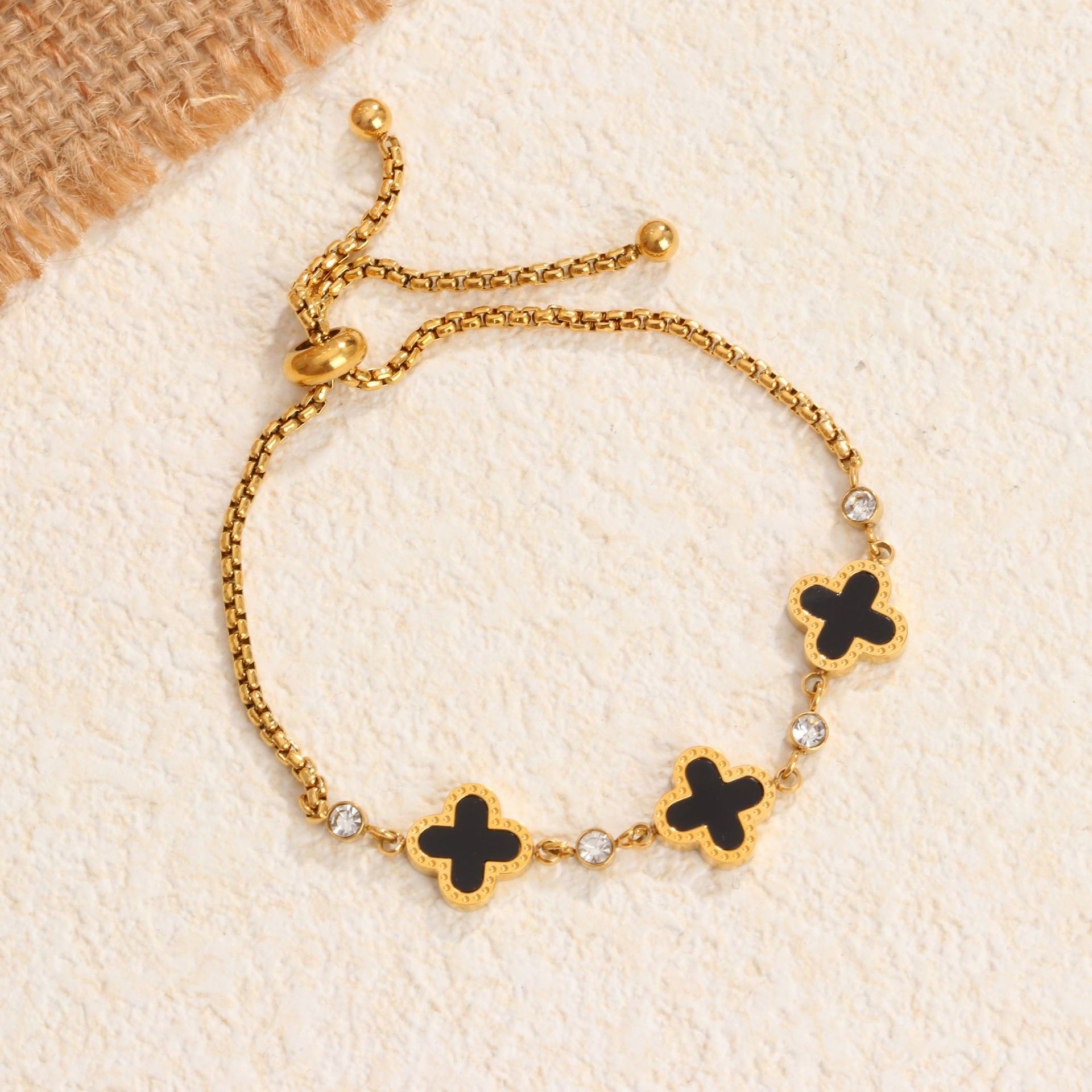 Gold Adjustable Clover Bracelet for Women - Black Enamel Four-Leaf Charms & CZ Crystals on Box Chain - Elegant Lucky Jewelry Gift