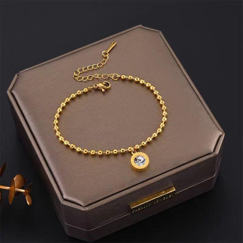 Gold Beaded Stainless Steel Bracelet – Adjustable Chain with Solitaire Crystal Charm, Elegant Jewelry for Women, OEM/ODM Supplier
