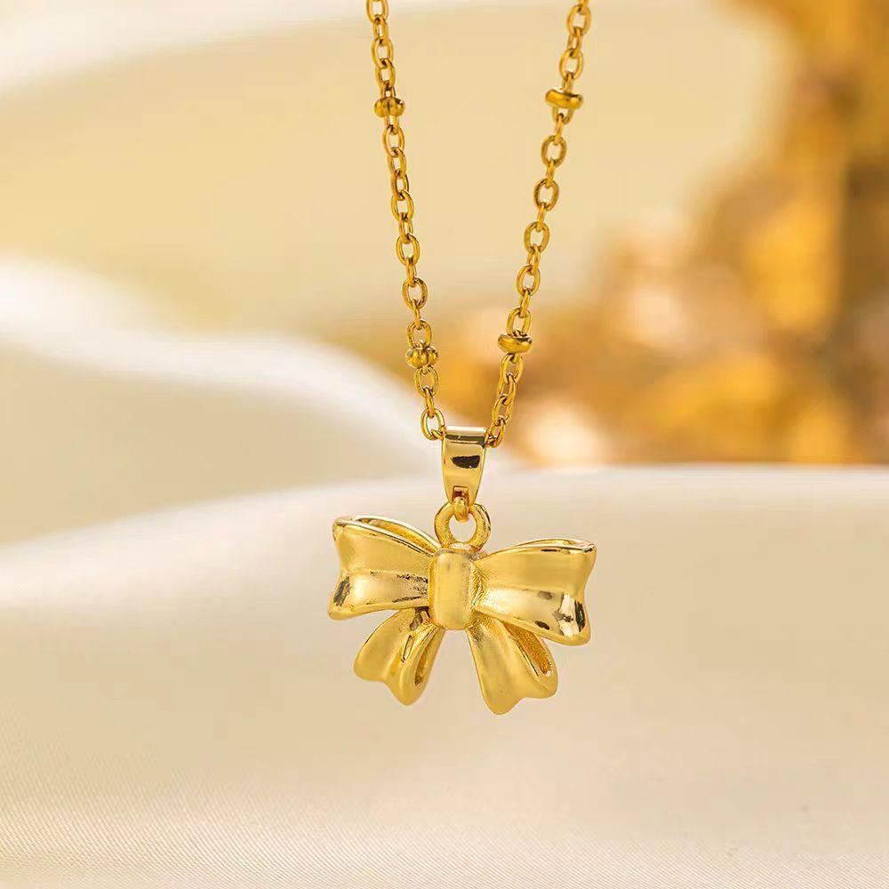 Gold Bow Pendant Necklace – Elegant and Cute Jewelry for Women