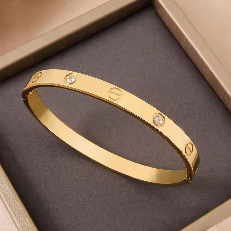 Gold Screw Motif Bangle Bracelet – Unisex Polished Iconic Jewelry