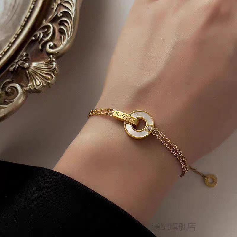Gold Stainless Steel Double Chain Bracelet for Women – Engraved LOVE Tag & Circle Charm, Adjustable Elegant Jewelry, Wholesale & OEM/ODM