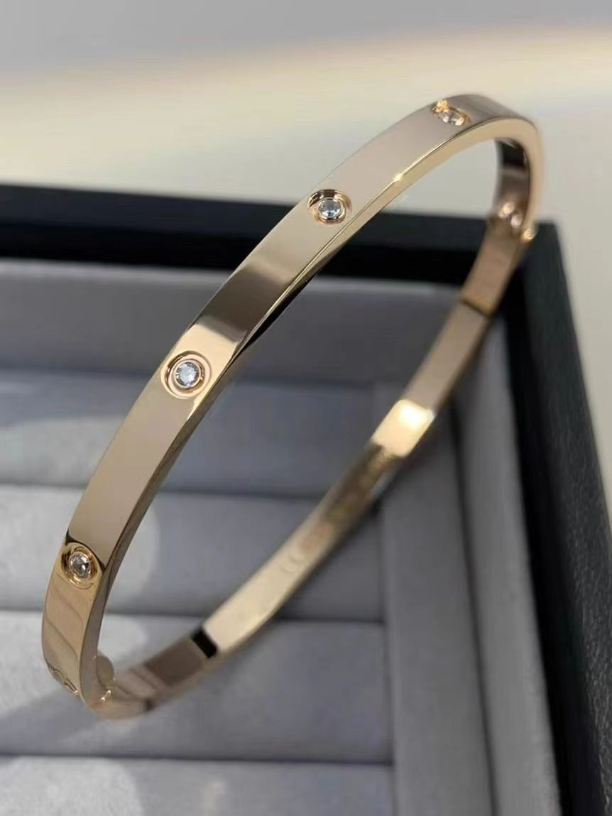 Luxury Gold Plated Screw Bangle with Sparkling Simulated Diamonds