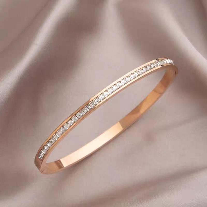 Rose Gold Bangle with Princess Cut Channel Set Simulated Diamonds