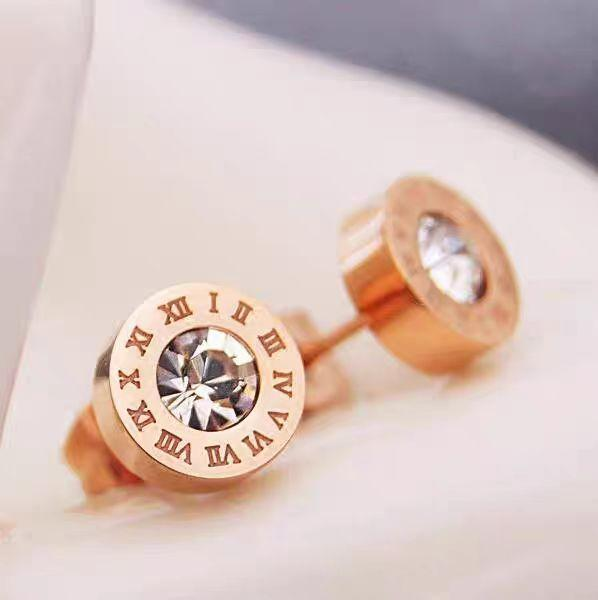 Rose Gold Roman Numeral Stud Earrings with Clear Round-Cut Diamond-Like Center – Elegant Solitaire Look for Everyday and Formal Wear
