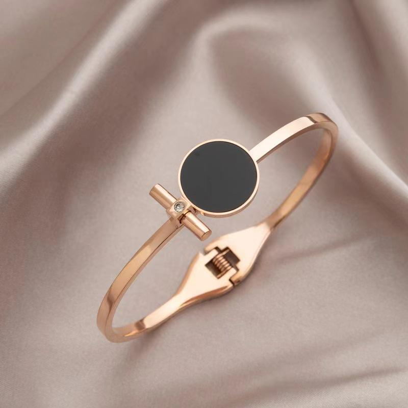 Rose Gold Stainless Steel Bangle with Black Enamel Circle & Bar Detail – Elegant Jewelry by Geili