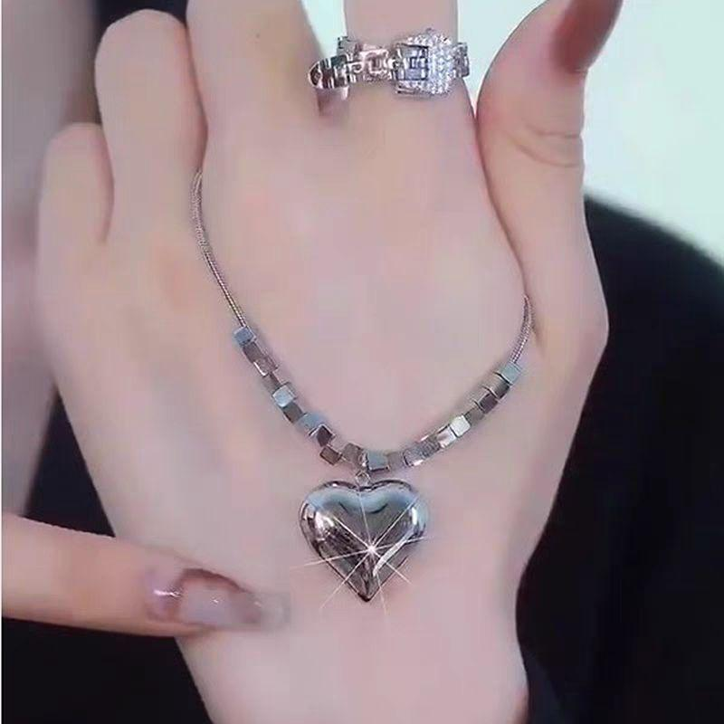 Titanium Steel Heart Pendant Necklace – Reflective Polished Chain for Women