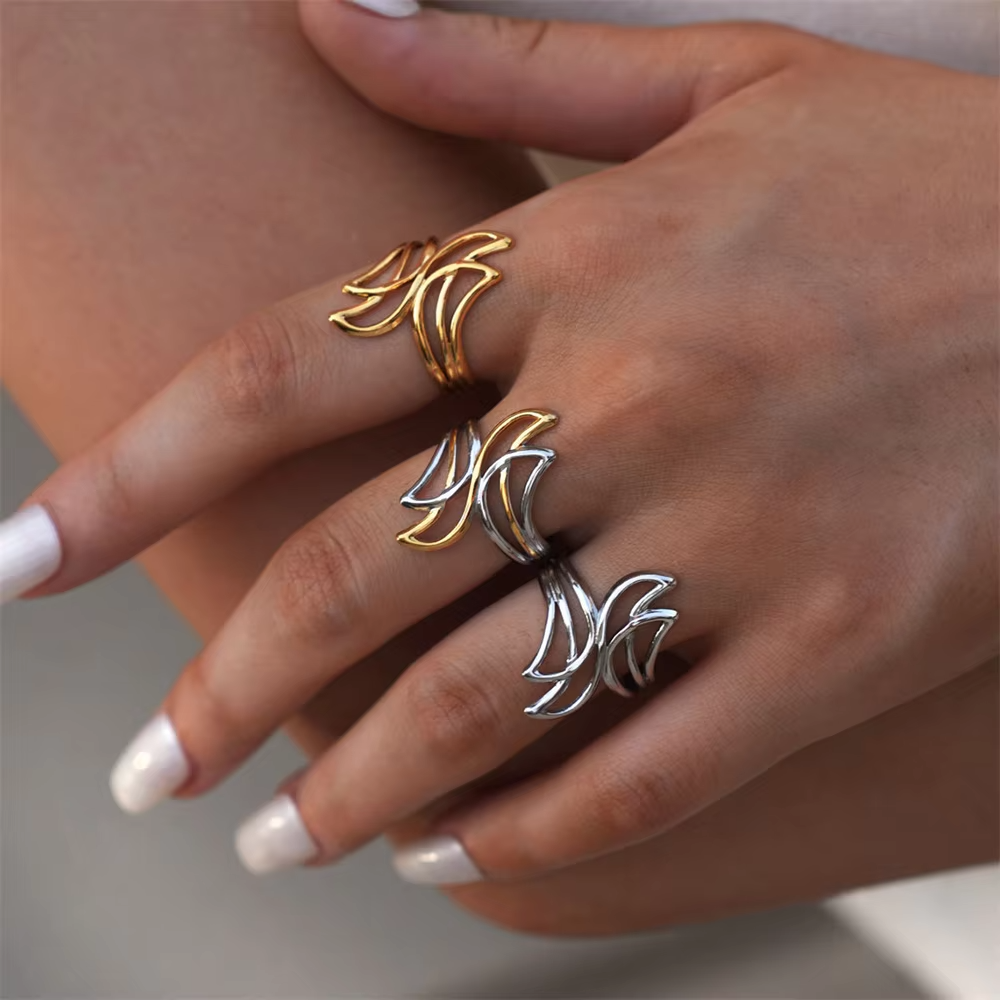 Trendy Stainless Steel Hollow Designer Finger Ring – Fashion Jewelry for Women 2025