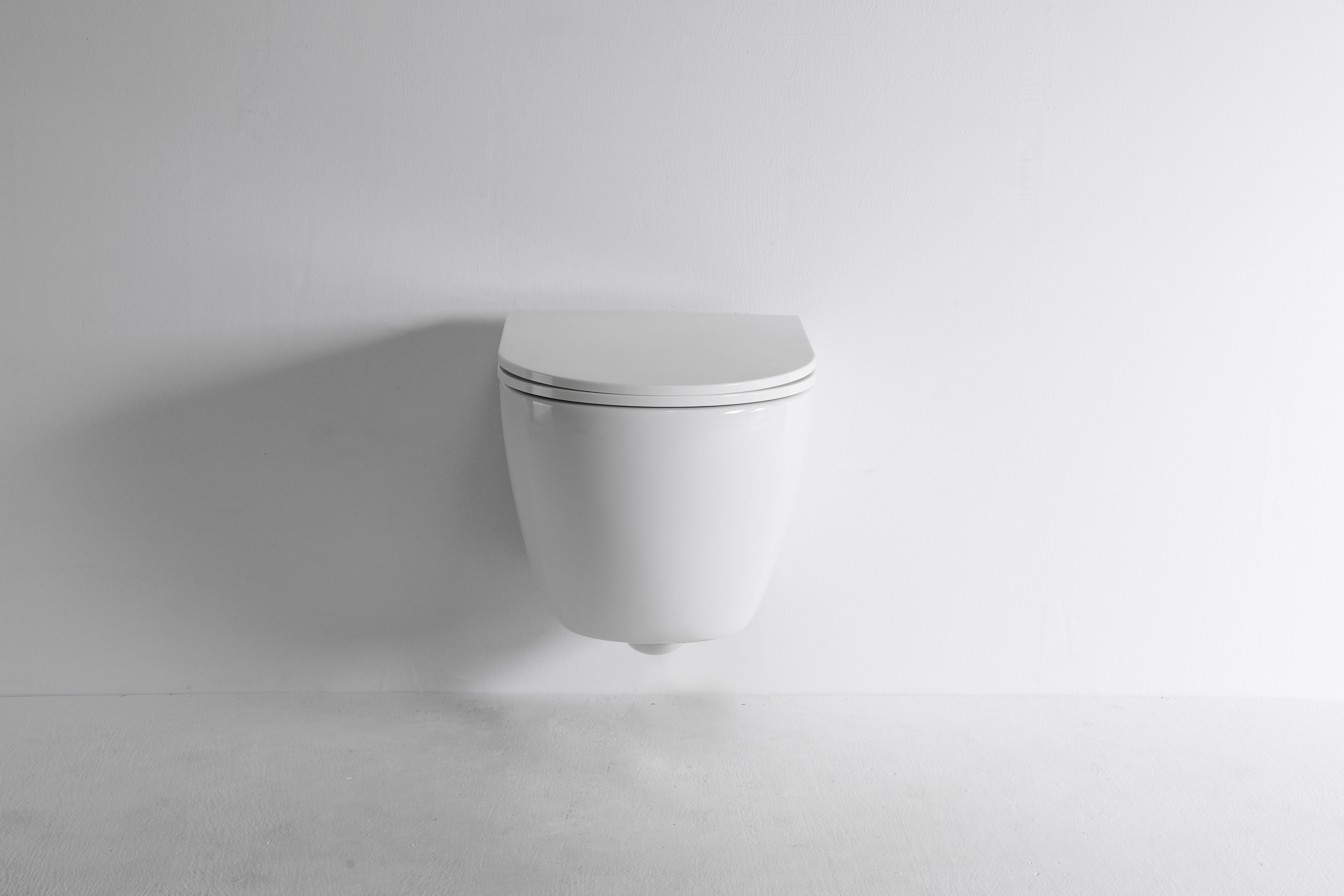 Italian Wall-Hung Toilet 2418E | Compact Ceramic Floating WC with Soft-Close Seat