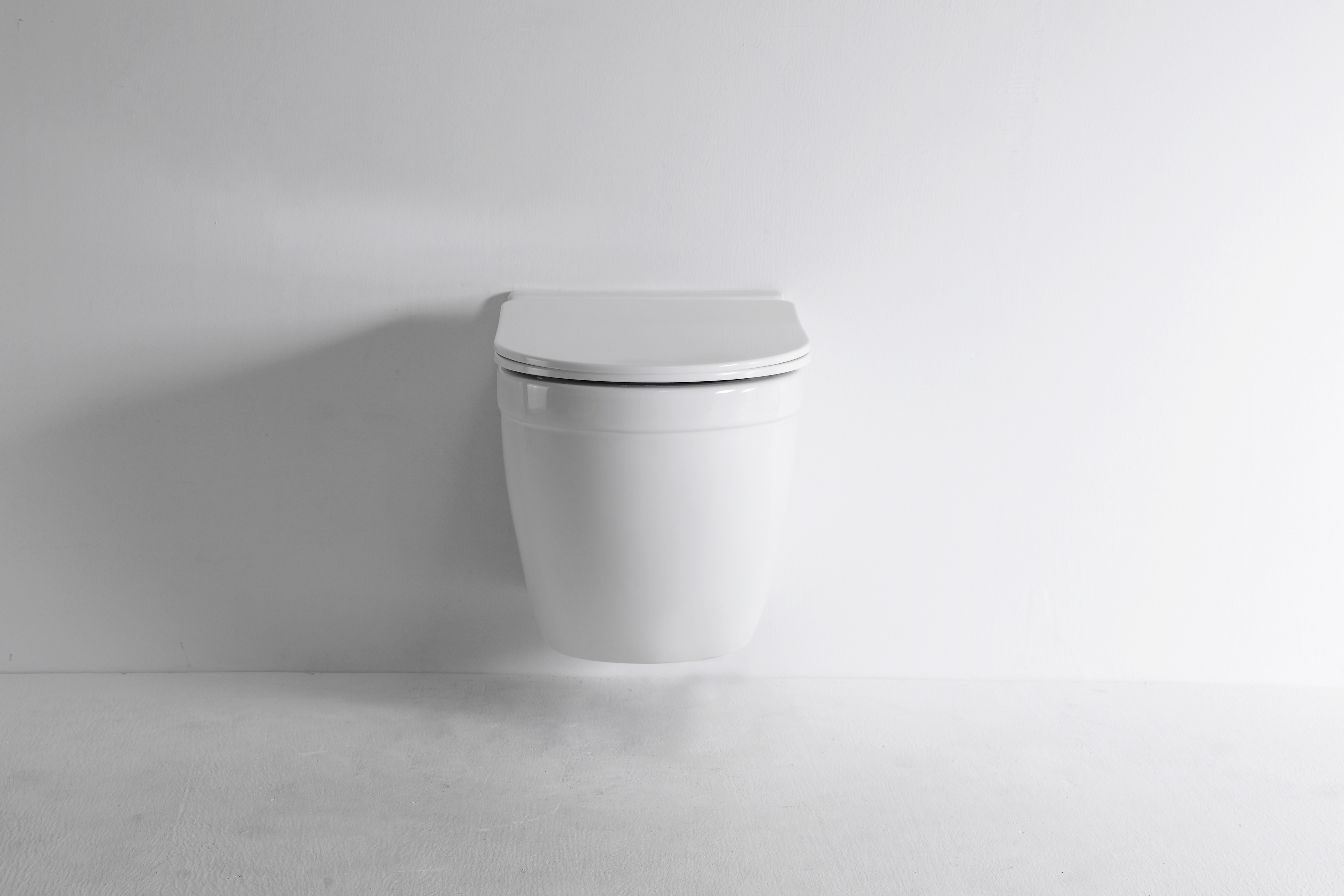 Modern Wall-Hung Toilet 2442D – Compact, Silent Flush, Soft Close Seat