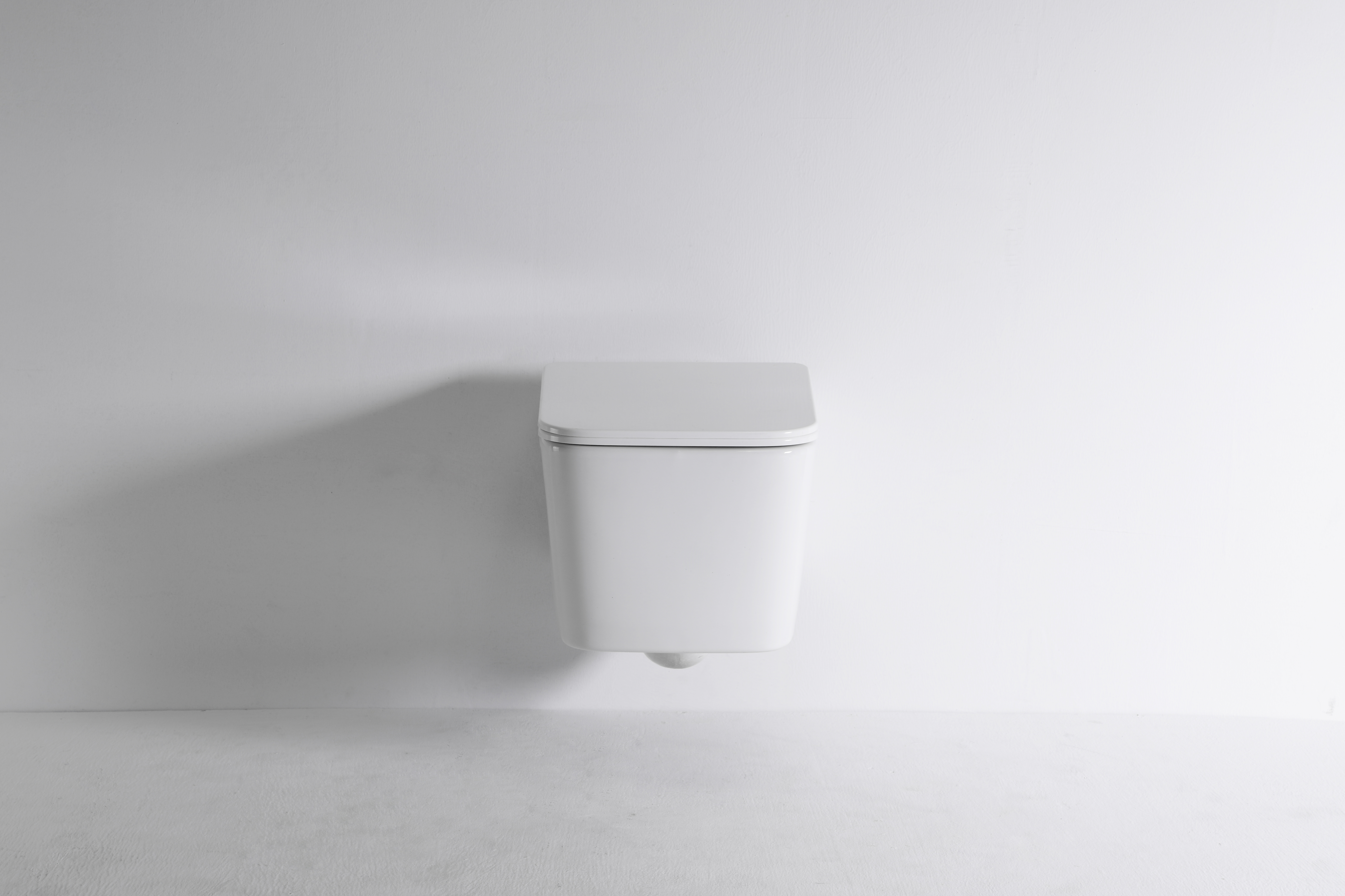 BF2467-Minimalist Perfection: White Wall-Hung Toilet with Stylish Flush
