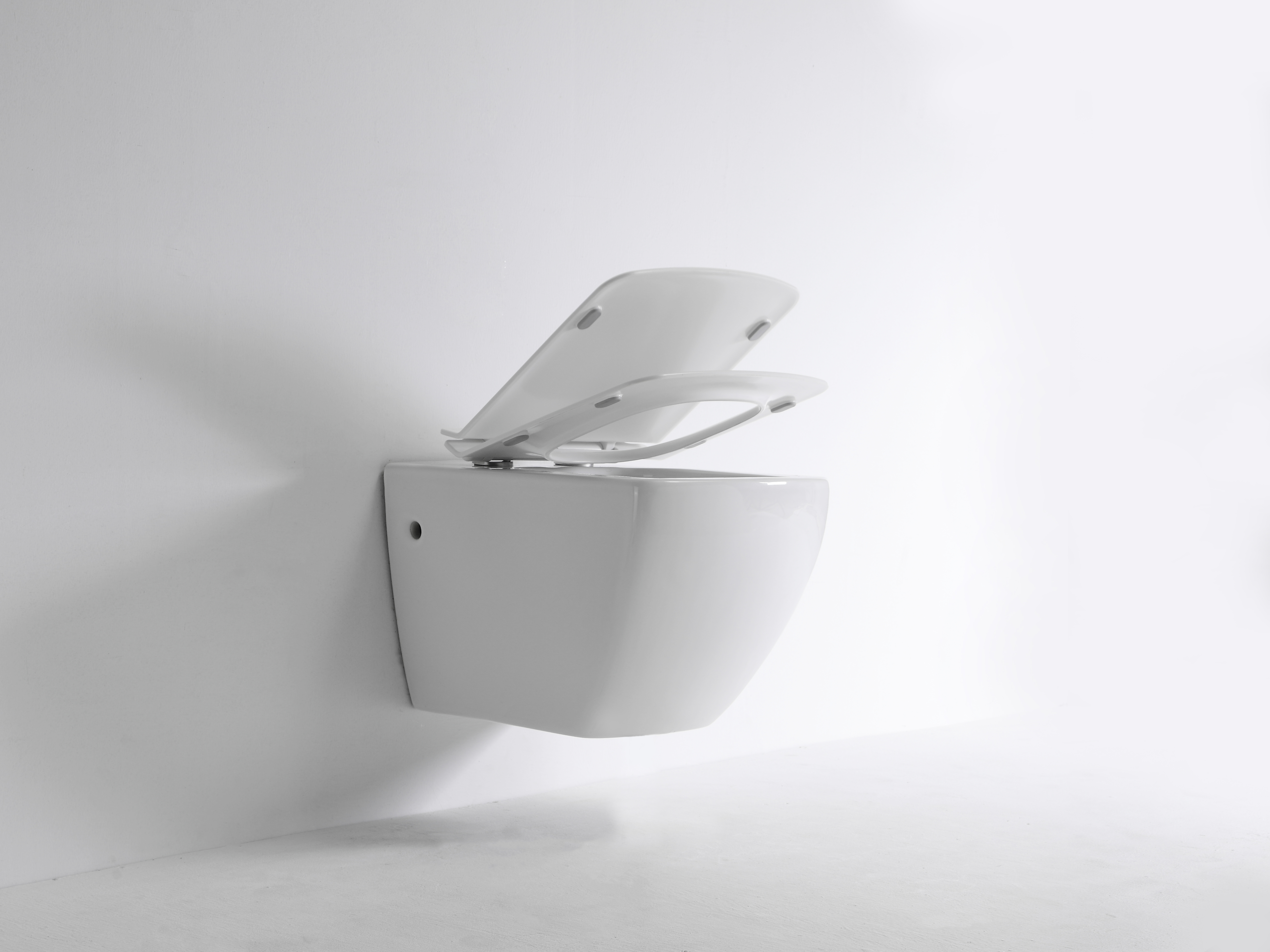 Rimless Wall-Hung Toilet with Square Slim Cover – Modern, Hygienic & Space-Saving