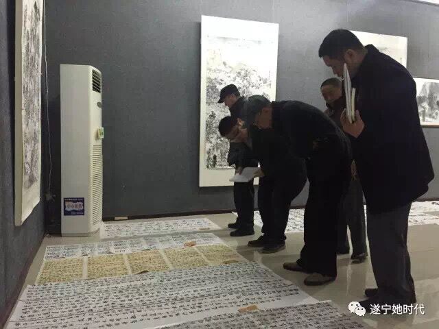 <span style="letter-spacing:normal;"><span style="letter-spacing:normal;">遂宁市首届“芬芳墨韵”女子书法大赛评审组认真开展评审工作</span></span>