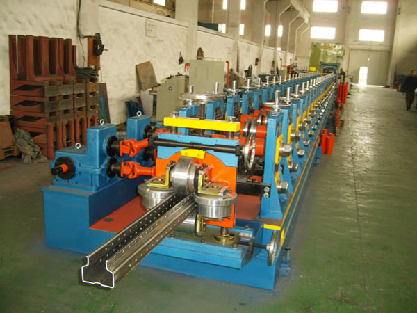 Shelf upright slat roll forming machine