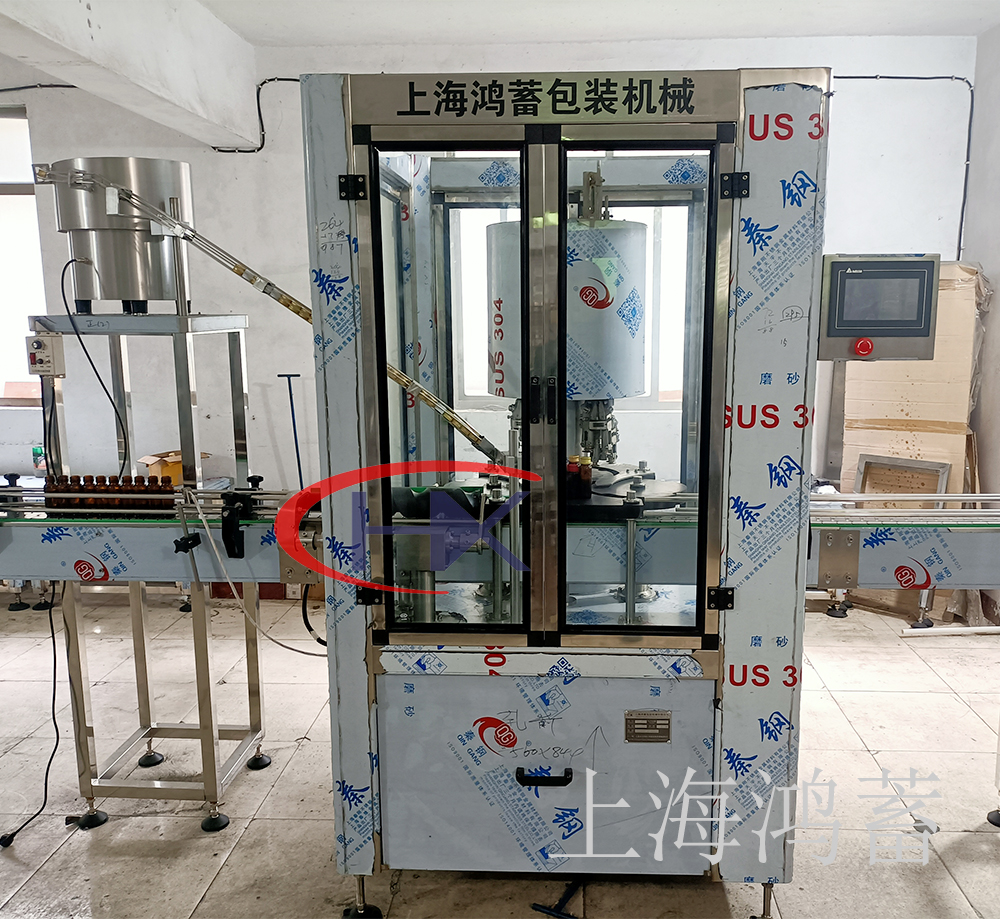 四頭鋁蓋封口機(jī)（回轉(zhuǎn)式封口）