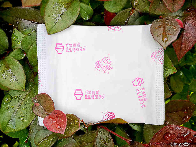 Flushable and biodegradable plastic film for sanitary napkins