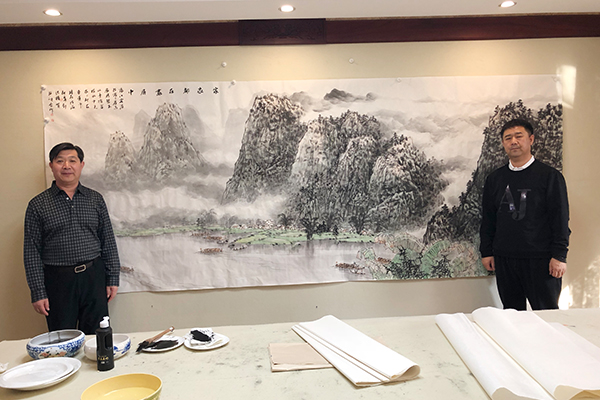 北京市美术家协会副主席贺成才与昌宇集团董事长李刚在昌宇美术家创作基地合影