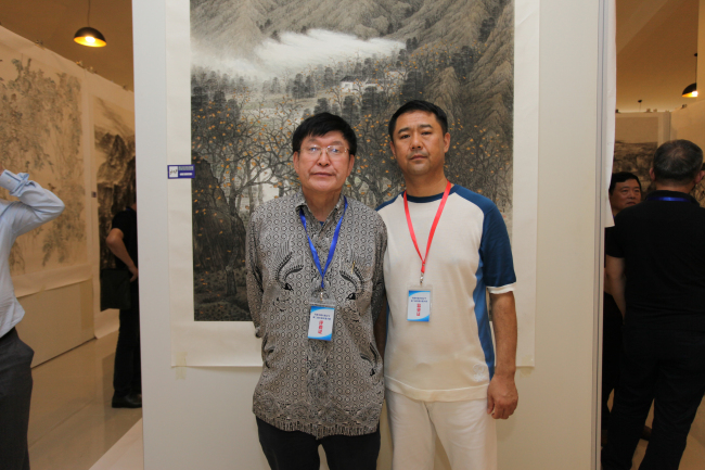 黑龙江美协主席吴团良 李总