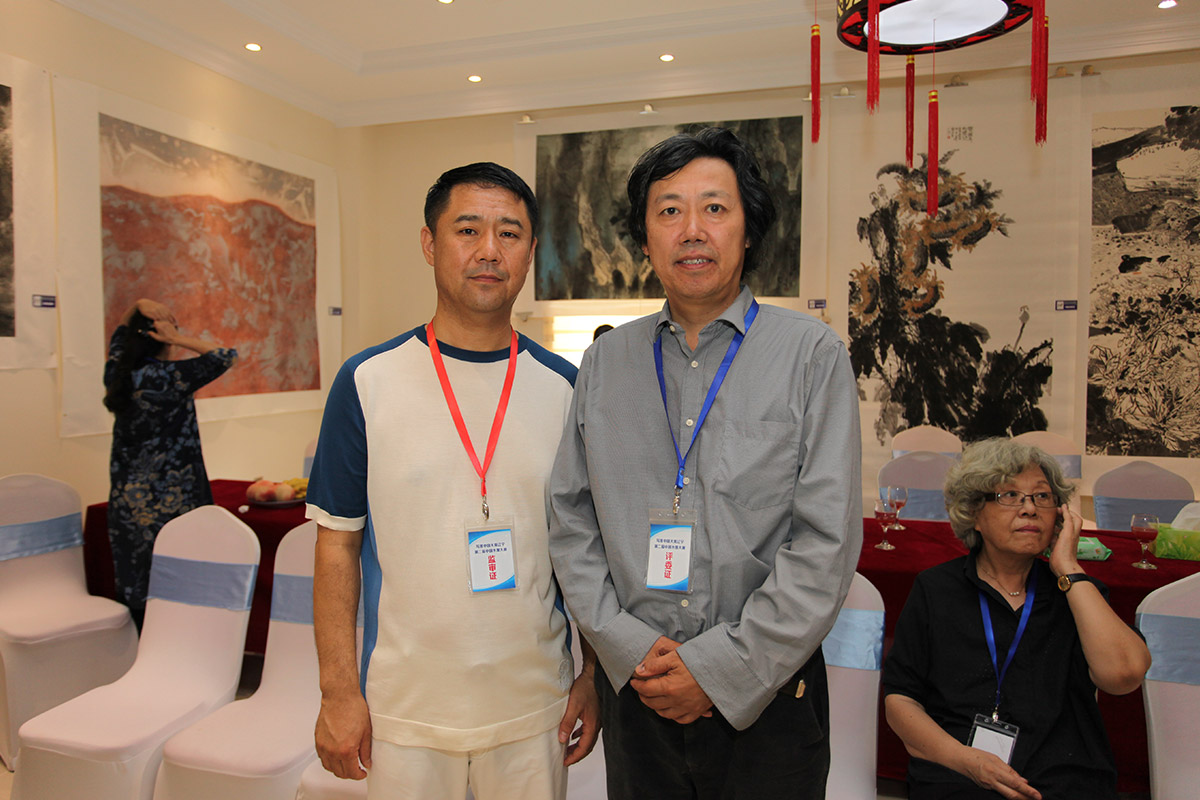 昌宇集团董事长李刚-中国美术家协会艺术中心主任丁杰