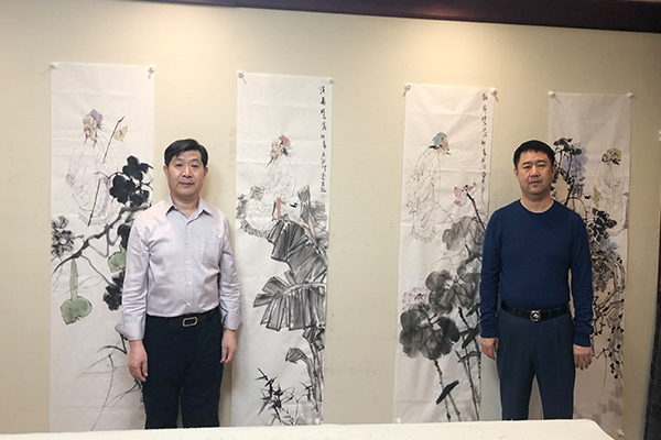 左北京市美术家协会副主席 贺成才 右昌宇集团董事长李刚