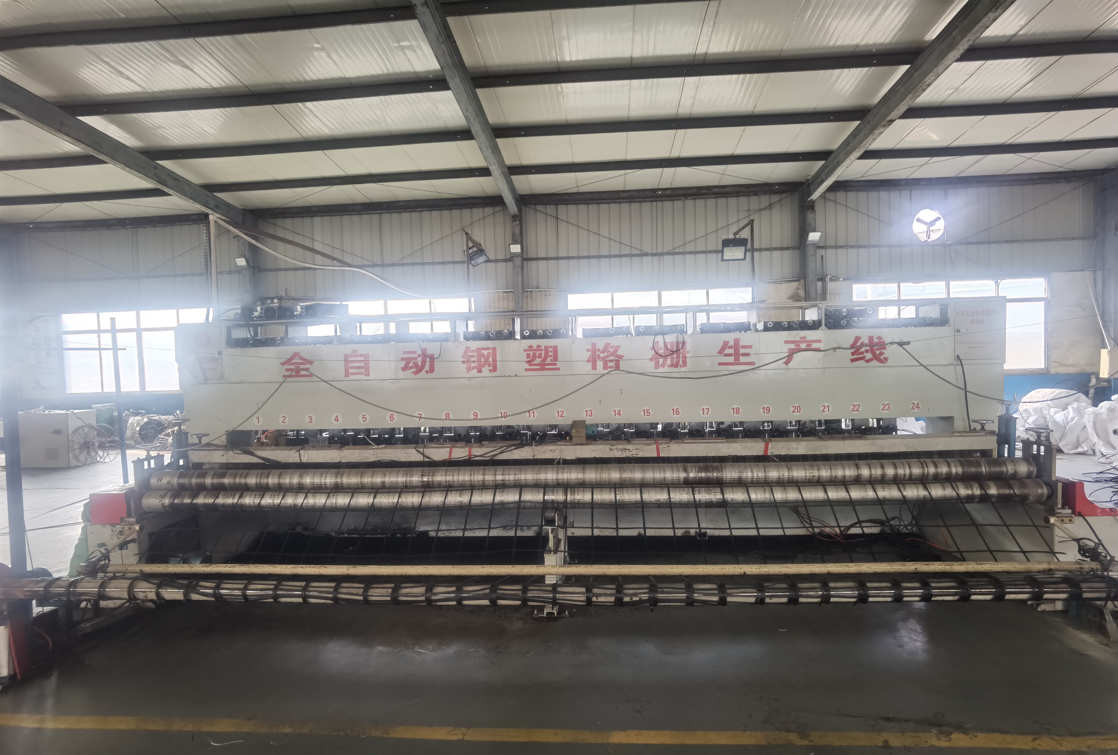 钢塑格栅生产线