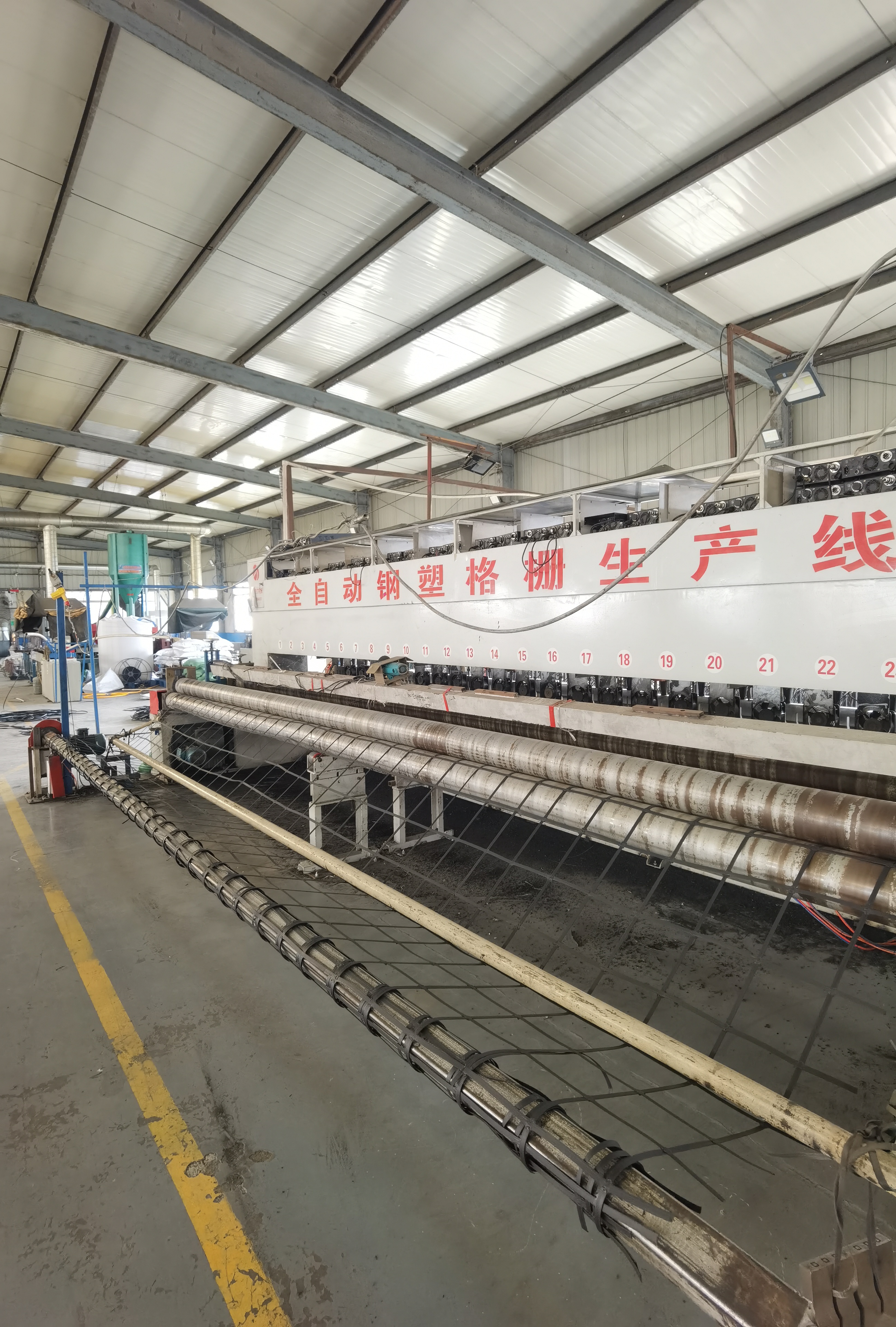 钢塑格栅生产线